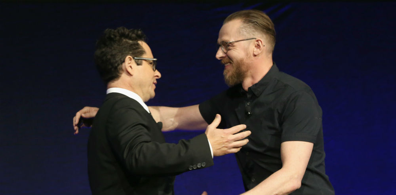 Star Trek Beyond producer J.J. Abrams and co-writer Simon Pegg embrace on stage at CinemaCon. The image’s official description does not mention Star Trek Beyond. (Image: Todd Williamson/Getty Images for CinemaCon).